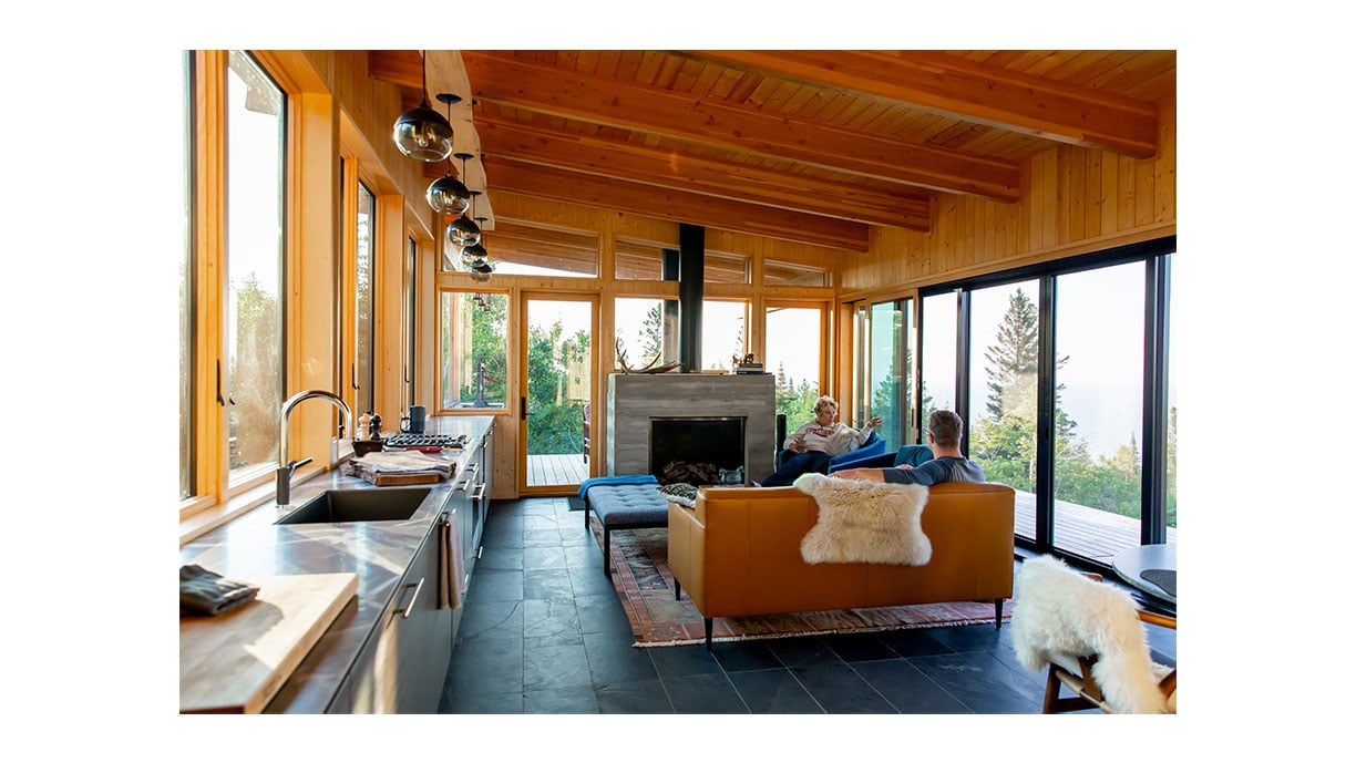 interior view of sunroom with fireplace