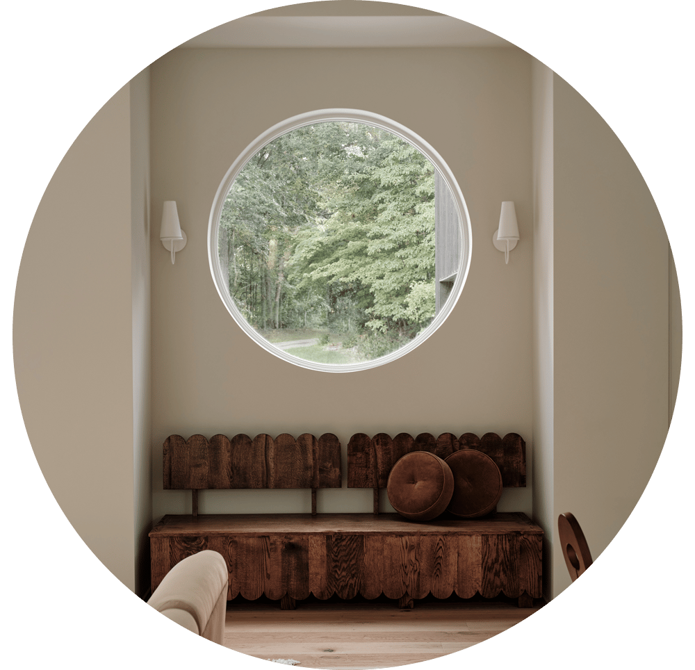Circle window in a cozy nook with a unique bench seat